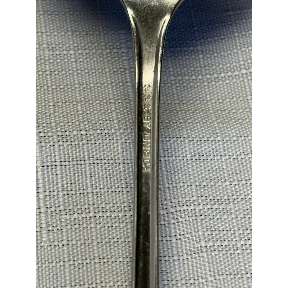 One Oneida Stainless Steel Serving Spoon Flared Handle Rectangular Base